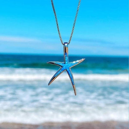 Fascinerende ketting met glanzende blauwe opaal en filigrane zilveren zeester-hanger